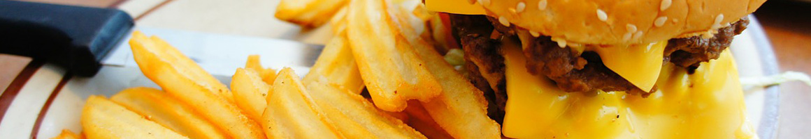 Eating Burger at Chris's Burgers restaurant in La Puente, CA.